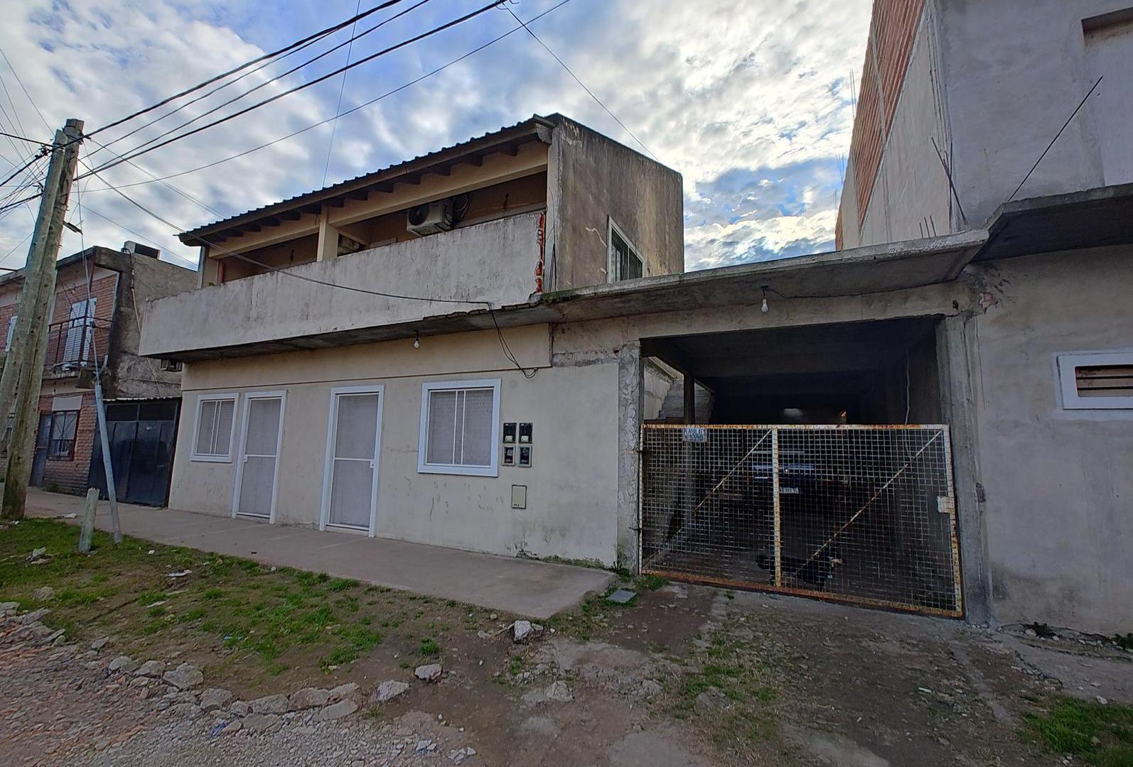 Propiedad a la venta con salón, departamentos terminar y terminados