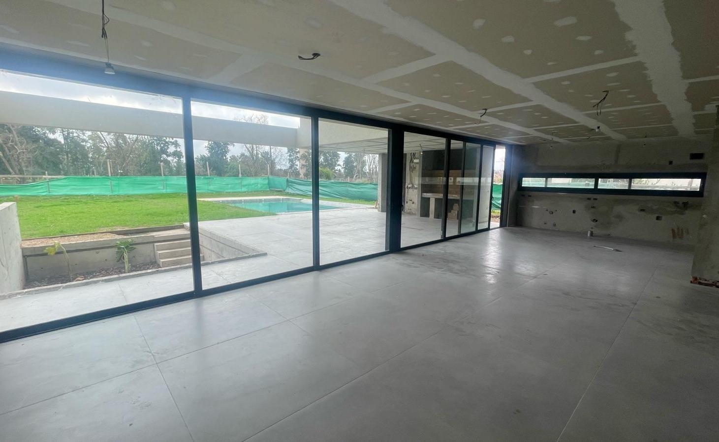 Foto de Casa en venta de 7 ambientes en el barrio Ayres de Pilar, imagen 1
