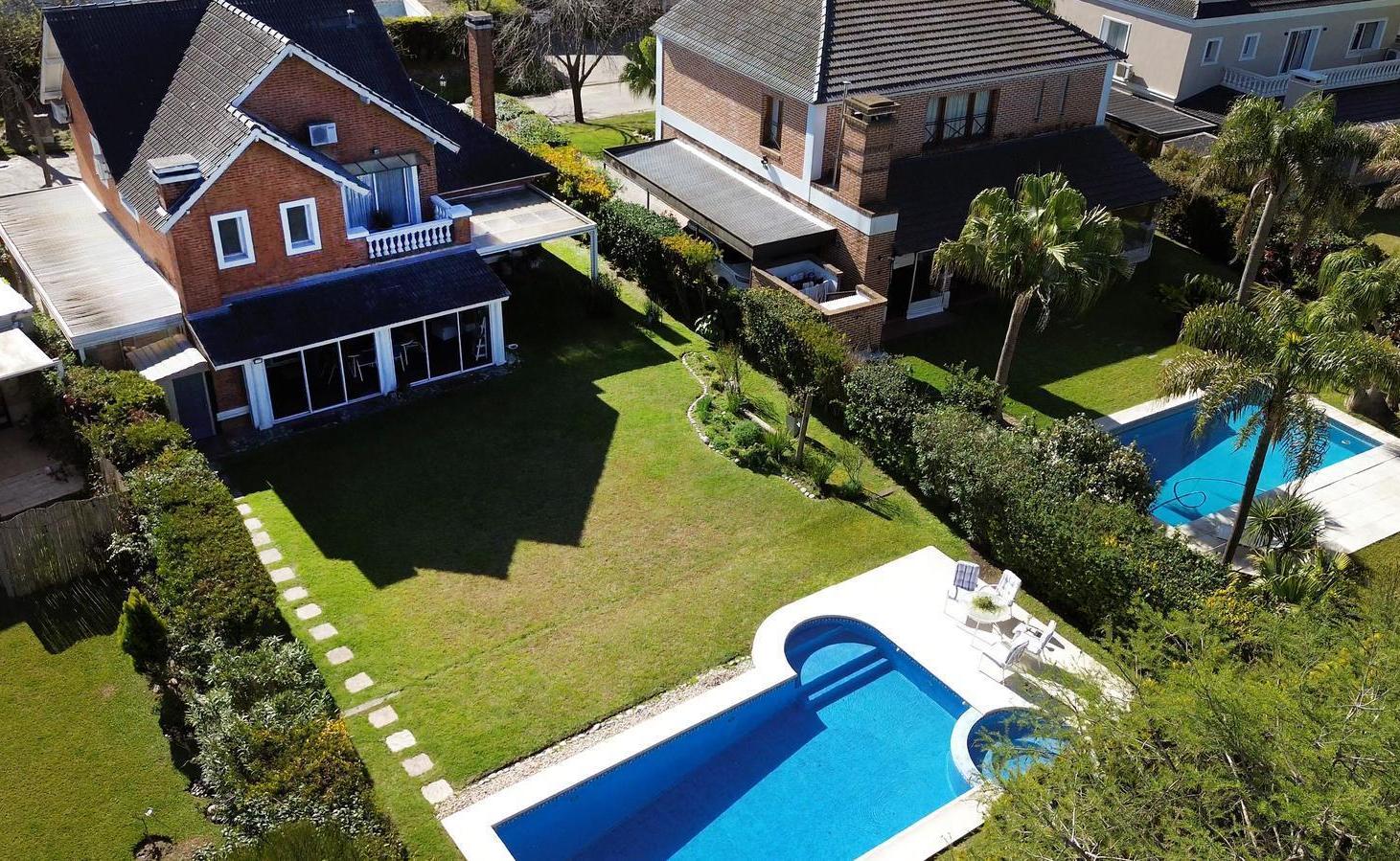 Foto de Casa en venta de 5 ambientes en el barrio Septiembre, Escobar, GBA Norte, imagen 1