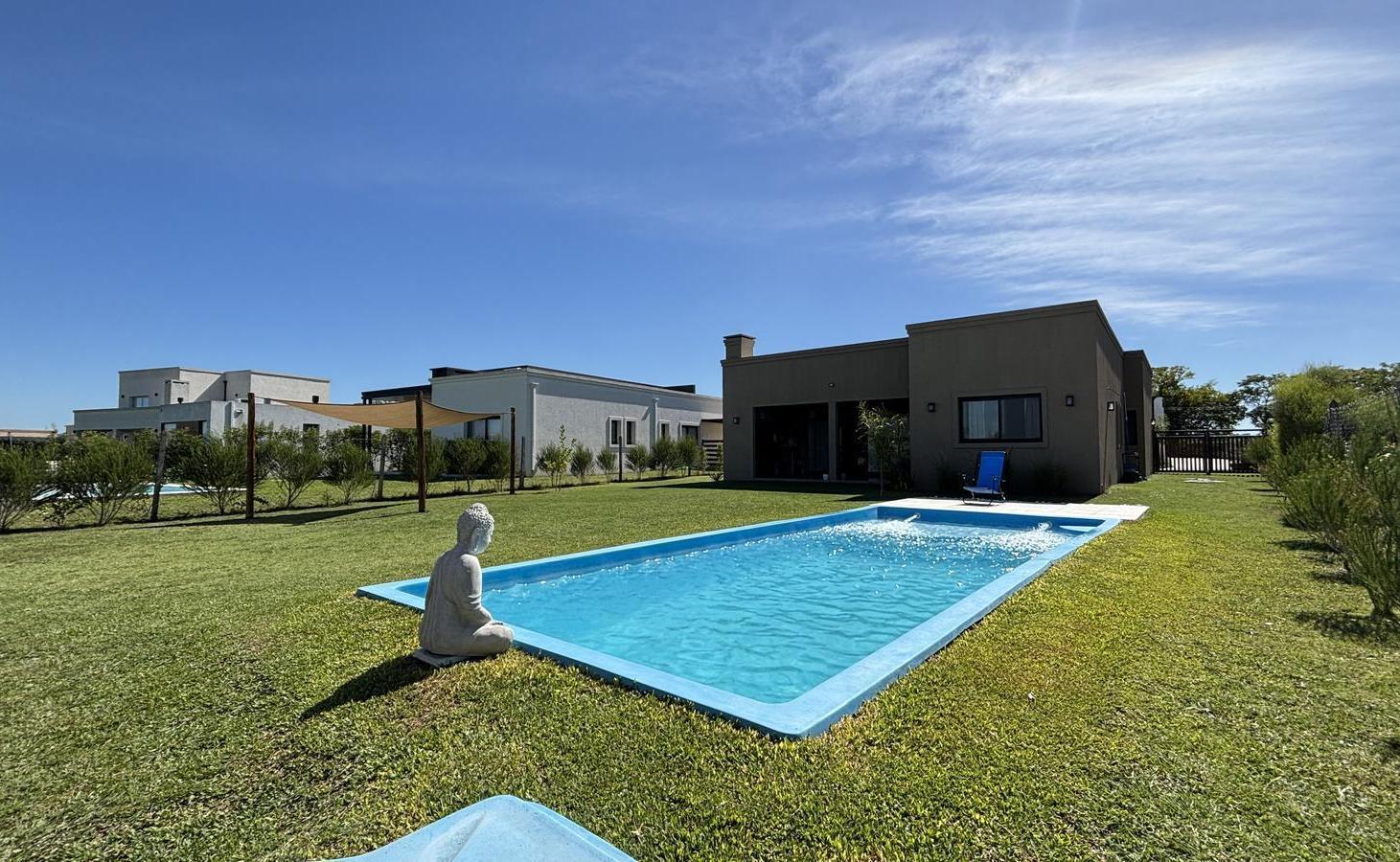 Foto de VENTA CASA 4AMB PILETA AMPLIO LOTE INTERNO CASI NUEVA PILAR DEL ESTE, imagen 3