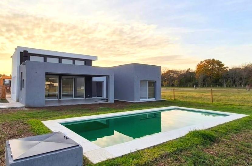 Foto de VENTA CASA 5 AMBIENTES PUERTOS DEL LAGO SECTOR NATIVAS CON PILETA, imagen 1