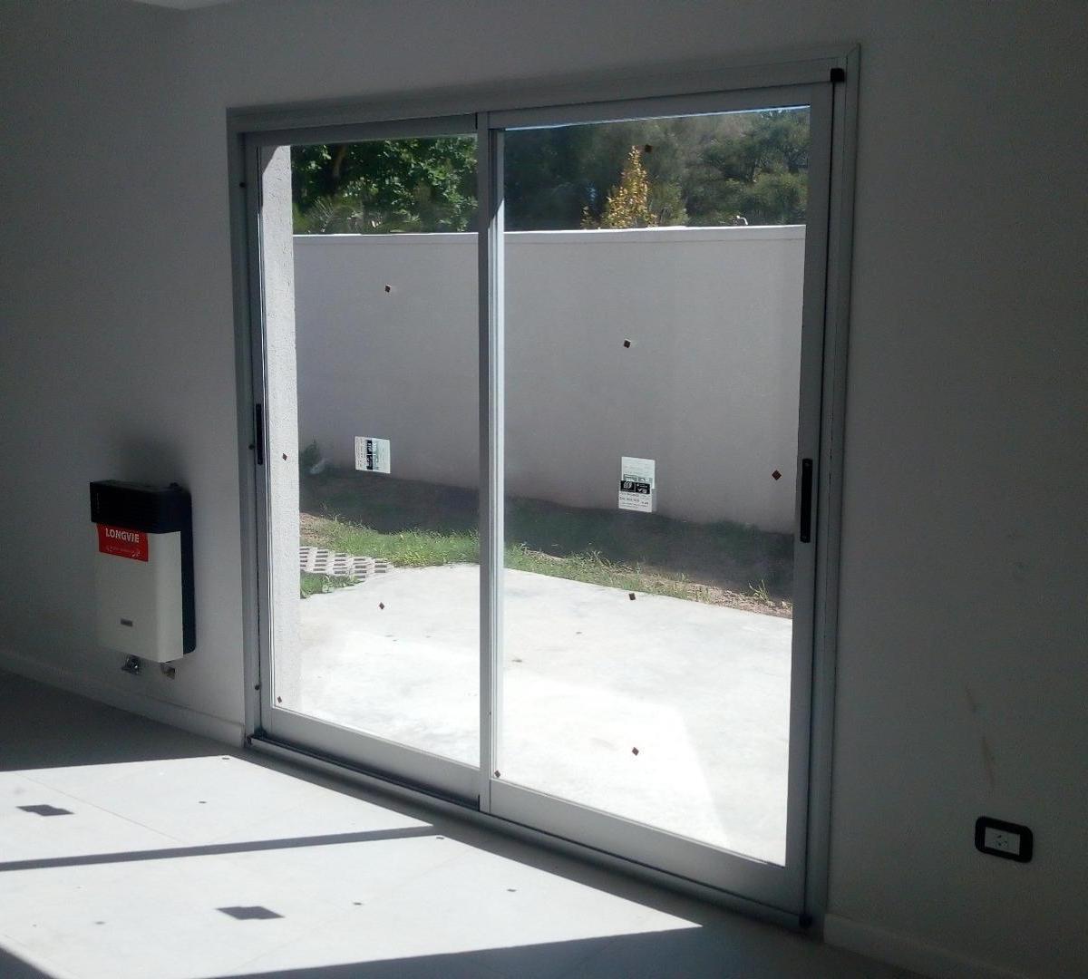 Foto de CASA EN VENTA EN COMPLEJO LOS TRINOS 2 DORMITORIOS - WILDE BIS 600, imagen 2