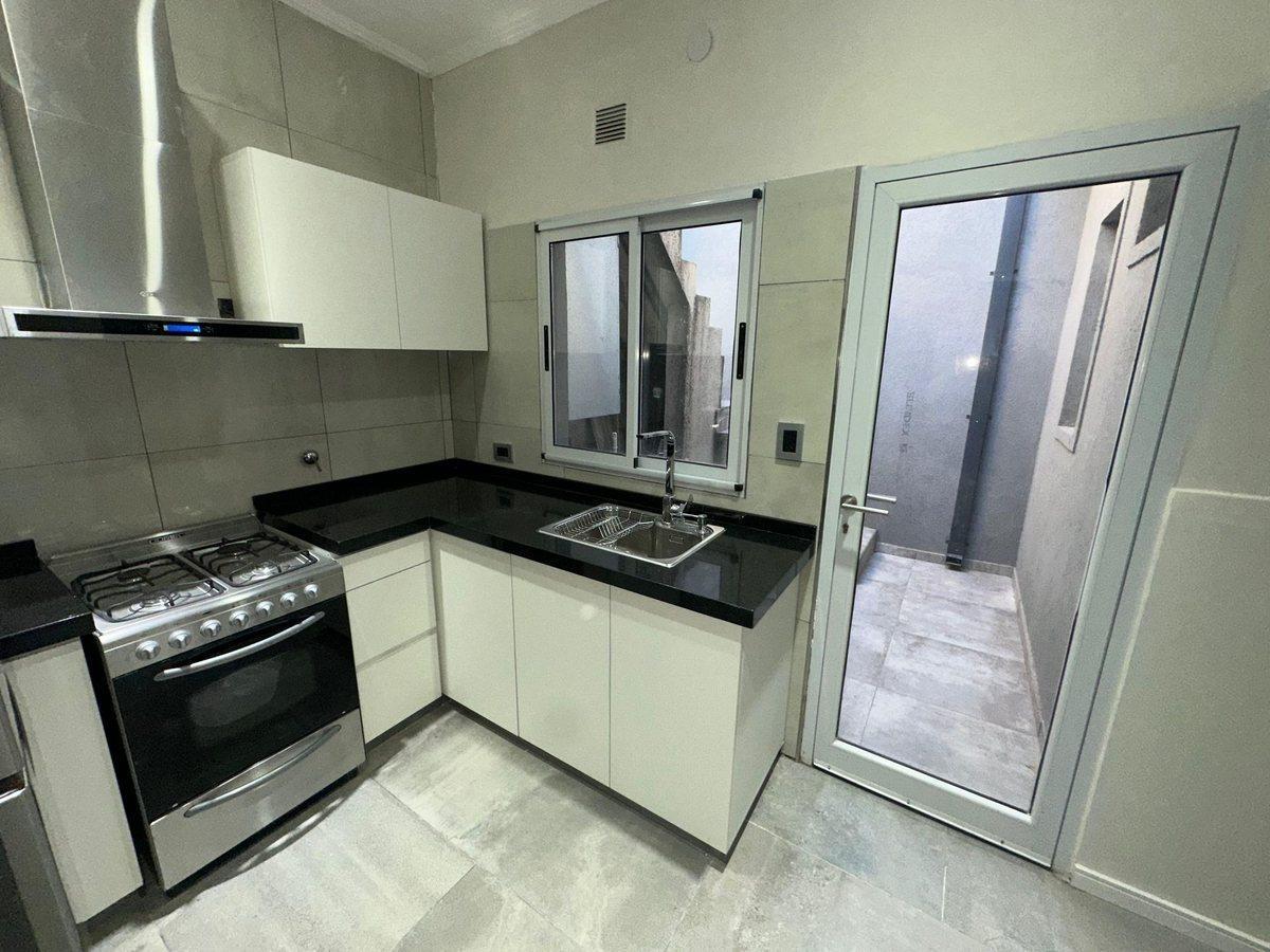 Foto de CASA EN VENTA A ESTRENAR 2 DORMITORIOS Y JARDIN, imagen 2