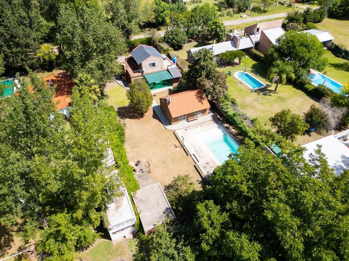 Foto de CASA EN VENTA EN FUNES 3 DORMITORIOS ZONA ARBOLADA, imagen 1
