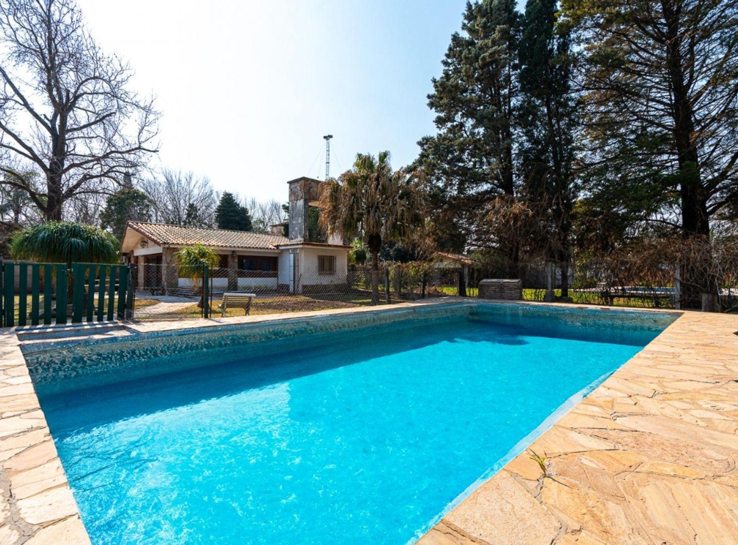 Foto de CASA EN VENTA DOS DORMITORIOS CON PILETA FUNES, imagen 2