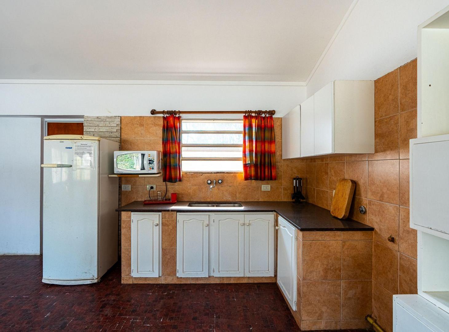 Foto de CASA EN VENTA DOS DORMITORIOS CON PILETA FUNES, imagen 3