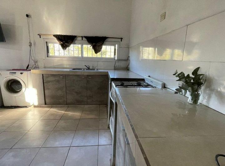 VENTA CASA 2 DORMITORIOS CON COCHERA EN UNQUILLO 3