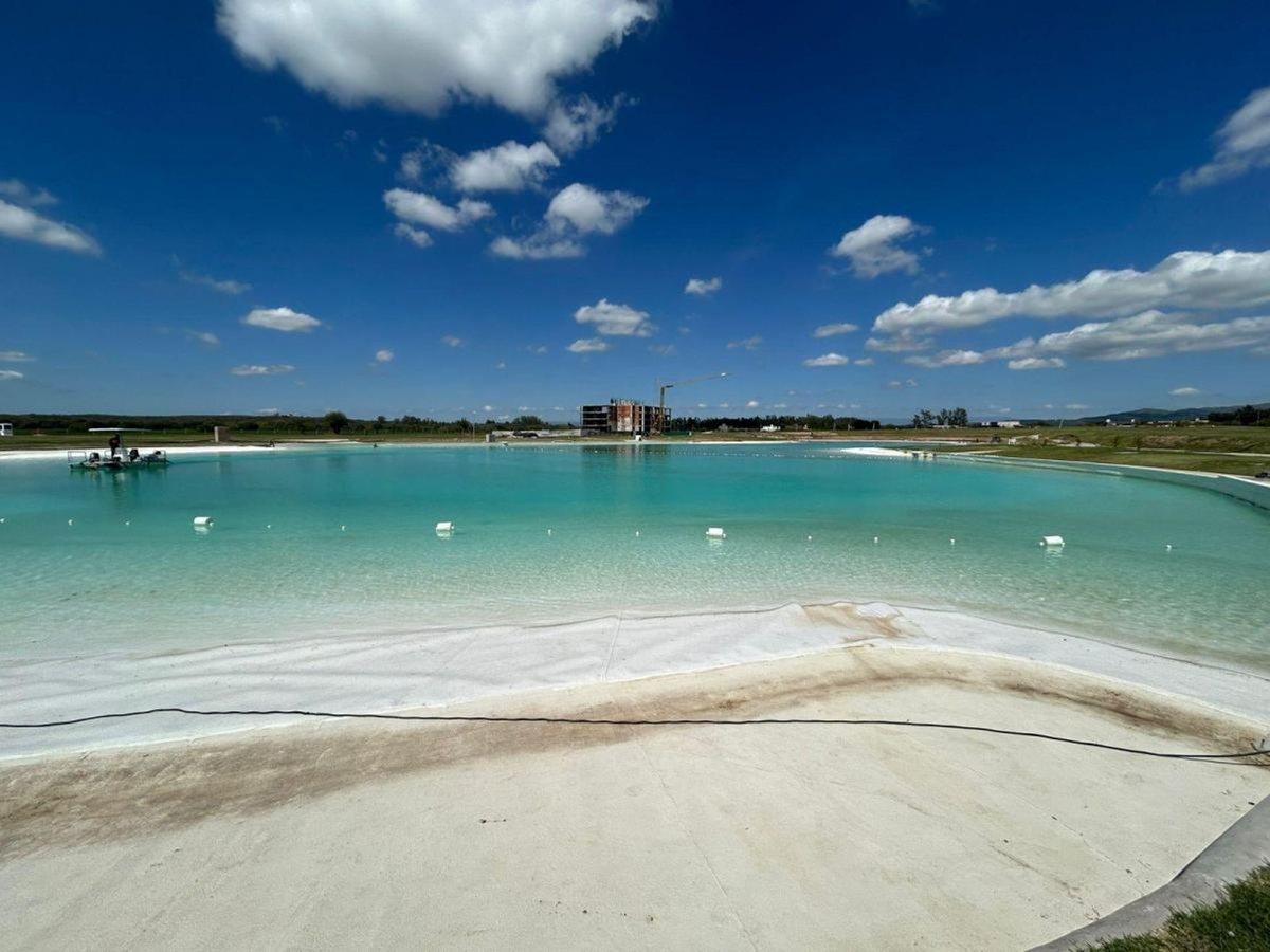 Foto de VENTA TERRENO BARRIO PRIVADO ACQUAVISTA MALAGUEÑO, imagen 1