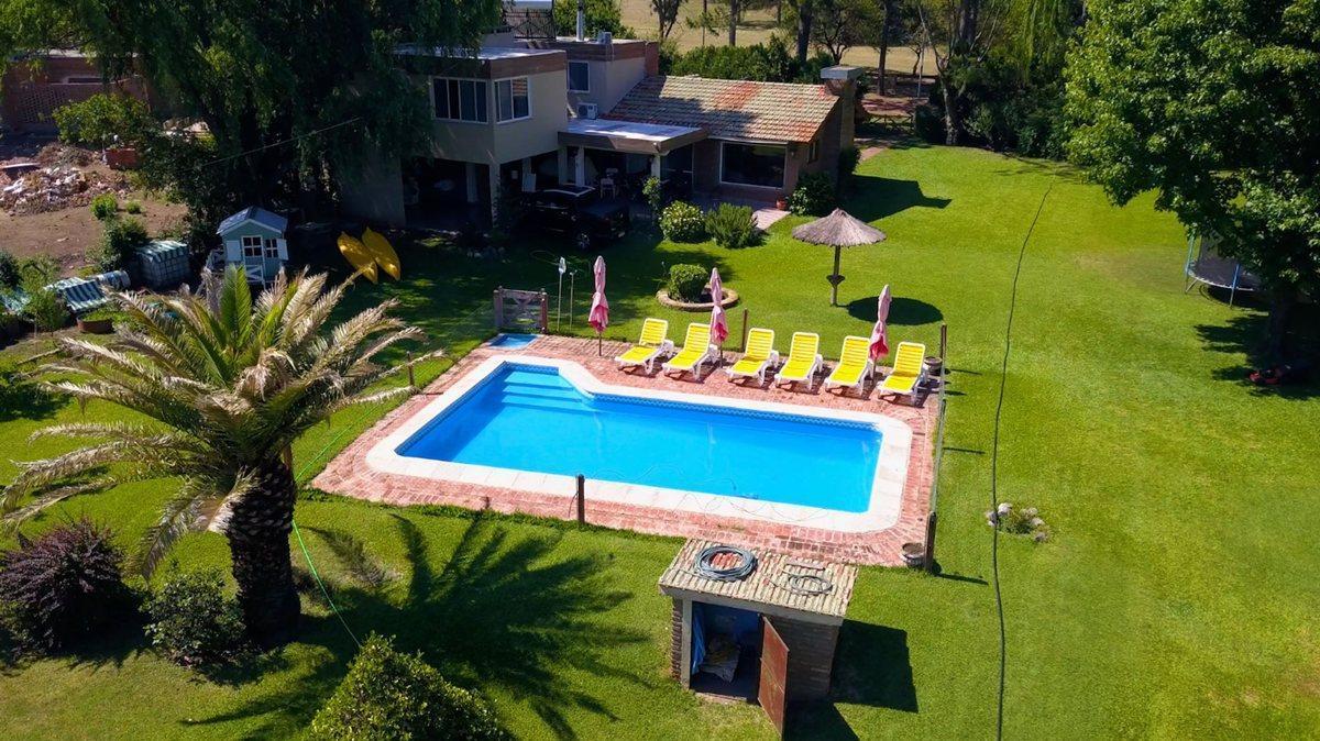 Foto de CASA 4 DORM Y PILETA - PLAYA GRANDE. V DEL DIQUE, imagen 1