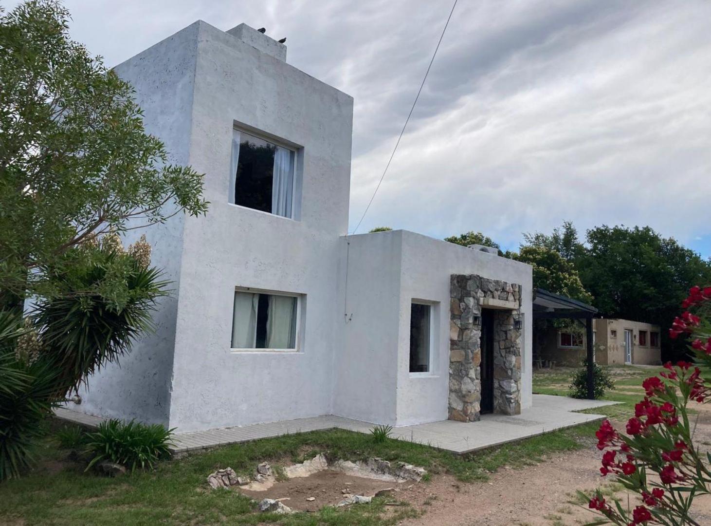 Foto de EN VENTA CASA MAS DPTO EN HUERTA GRANDE, imagen 1