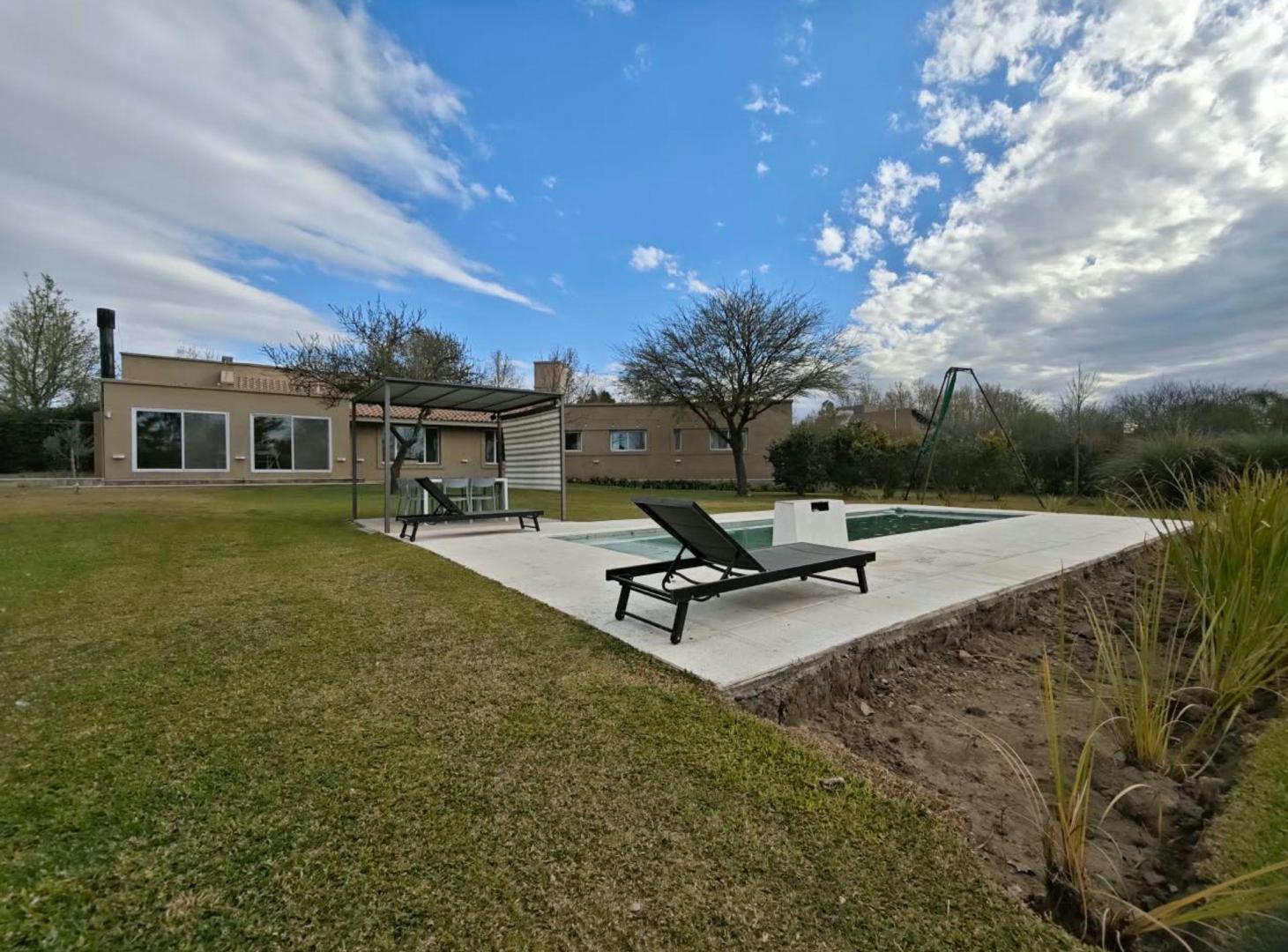 Foto de VENTA CASA 3 DORMITORIOS COUNTRY CAMPOS DEL VIRREY, imagen 1