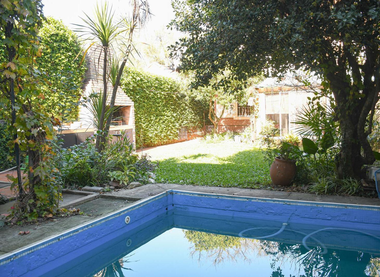 Venta casa Fisherton, Rosario 2 dormitorios con jardín y pileta. acepta permuta