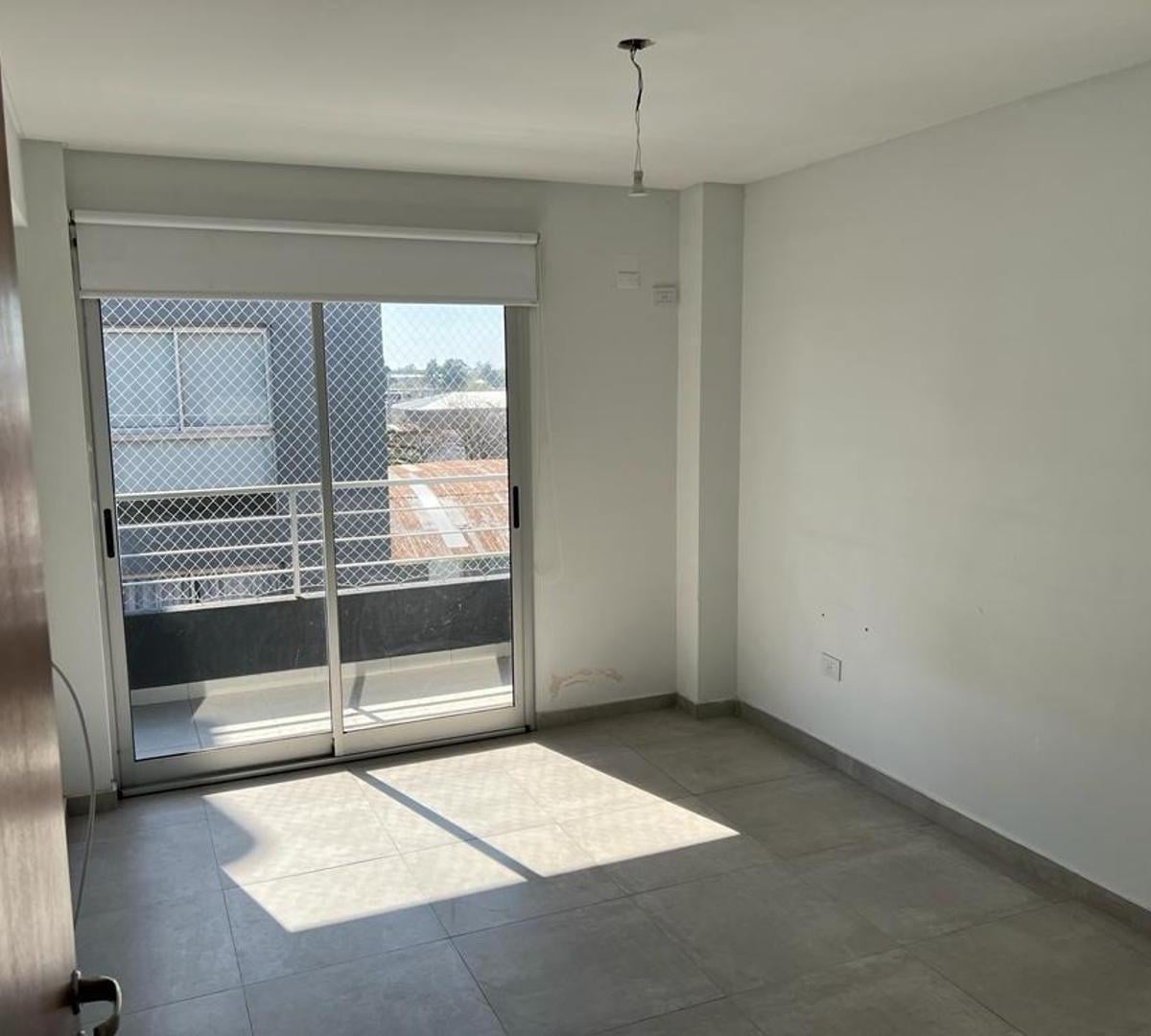 DEPARTAMENTO 2 AMBIENTES CON COCHERA
