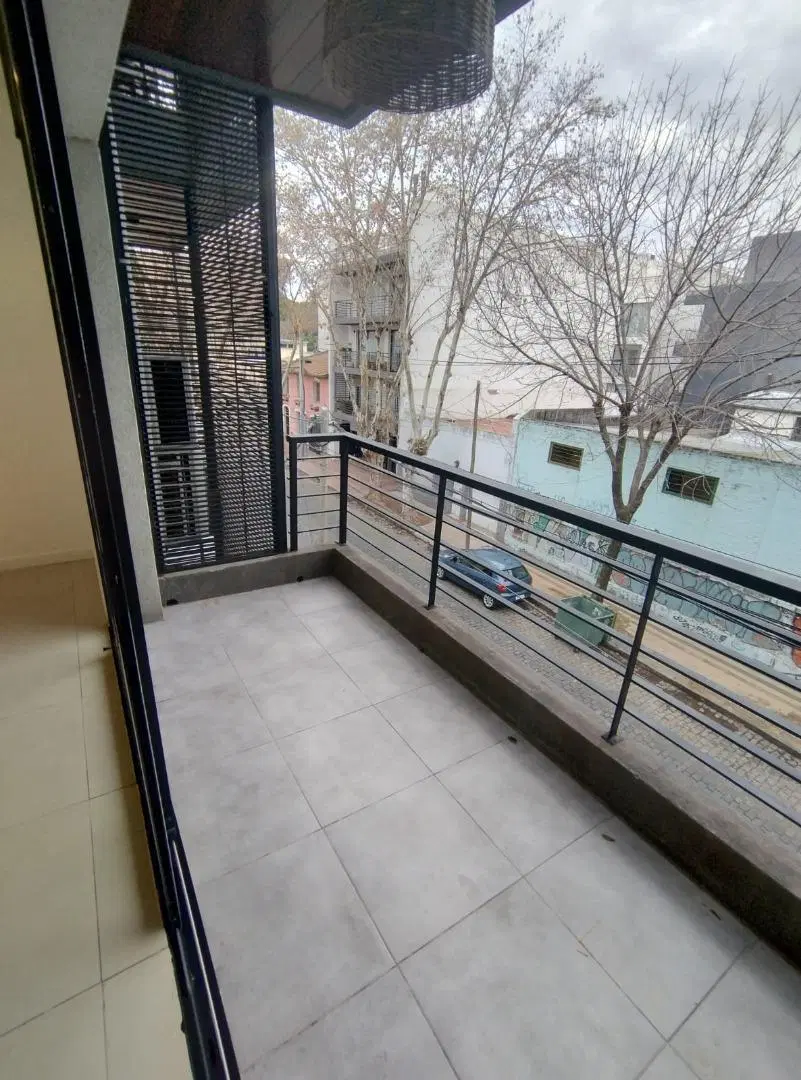 DEPARTAMENTO DOS AMBIENTES CON COCHERA Y BAULERA 5