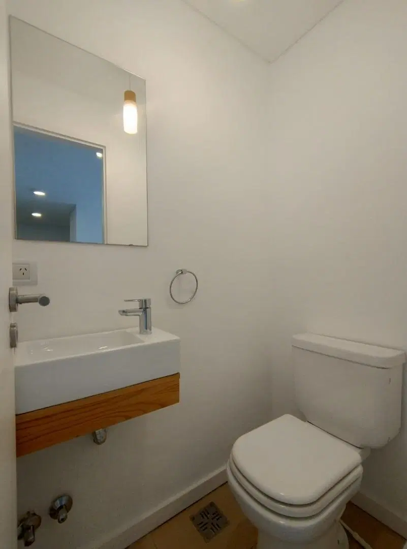 DEPARTAMENTO DOS AMBIENTES CON COCHERA Y BAULERA 4