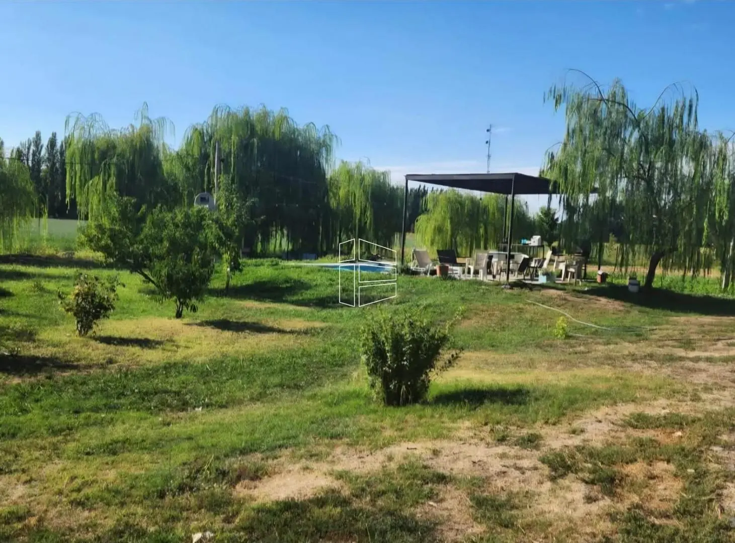 Venta - Chacra sobre calle Primeros Pobladores con casa - R026 3