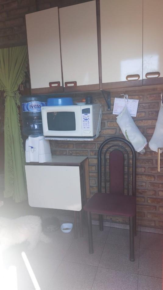 Propiedad Multifamiliar, Dos Locales, un Departamento y Una Casa en Planta Alta 2