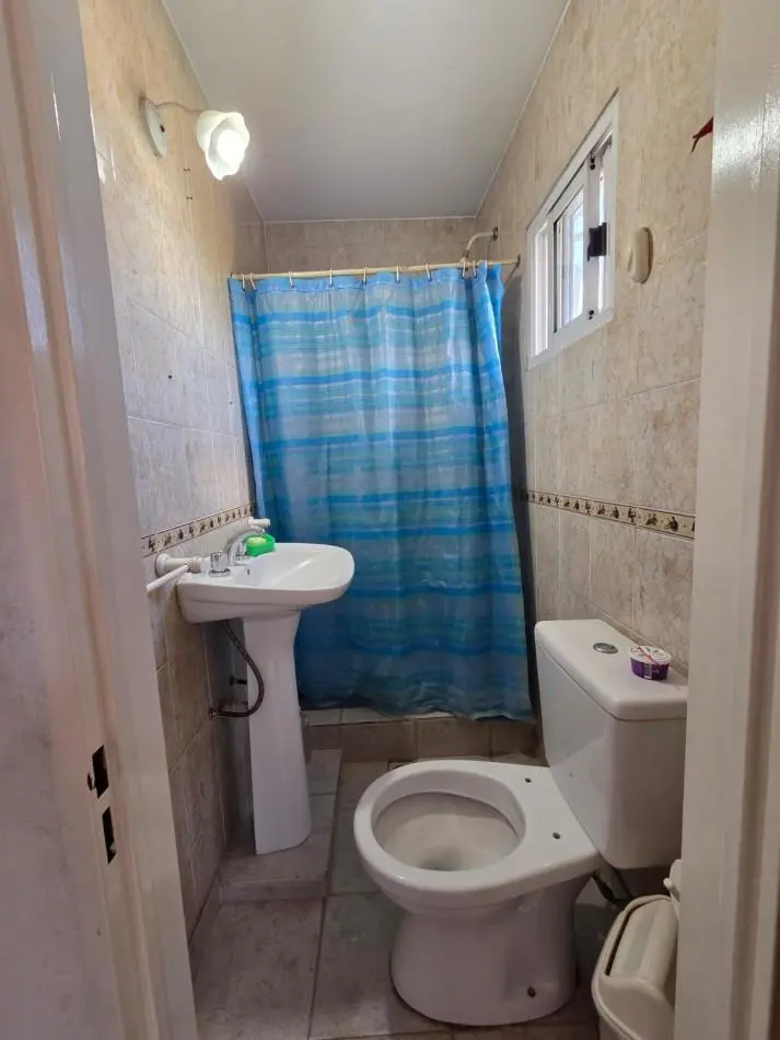 VENTA CASA MULTIFAMILIAR Y  LOCAL COMERCIAL  EN GONZALEZ CATAN 5