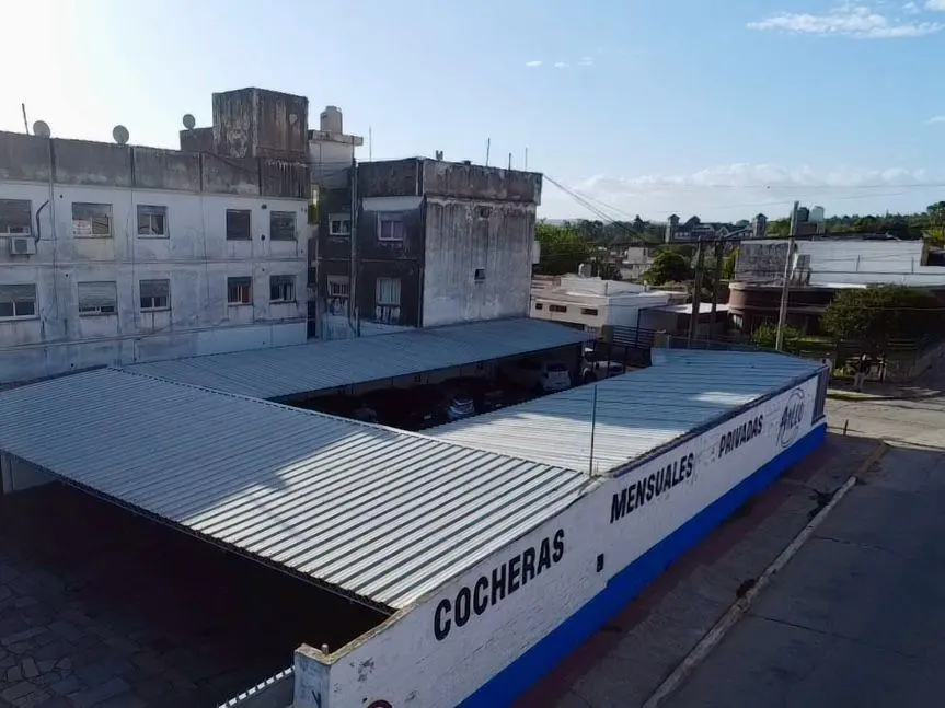 TERRENOS MAS GALPON EN VENTA CENTRO LA FALDA 4