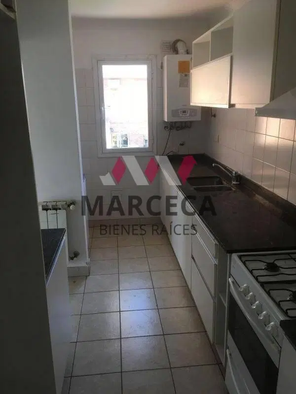 DEPTO VENTA DOS DORMITORIOS CON COCHERA BARRIO HUILLICHES 3