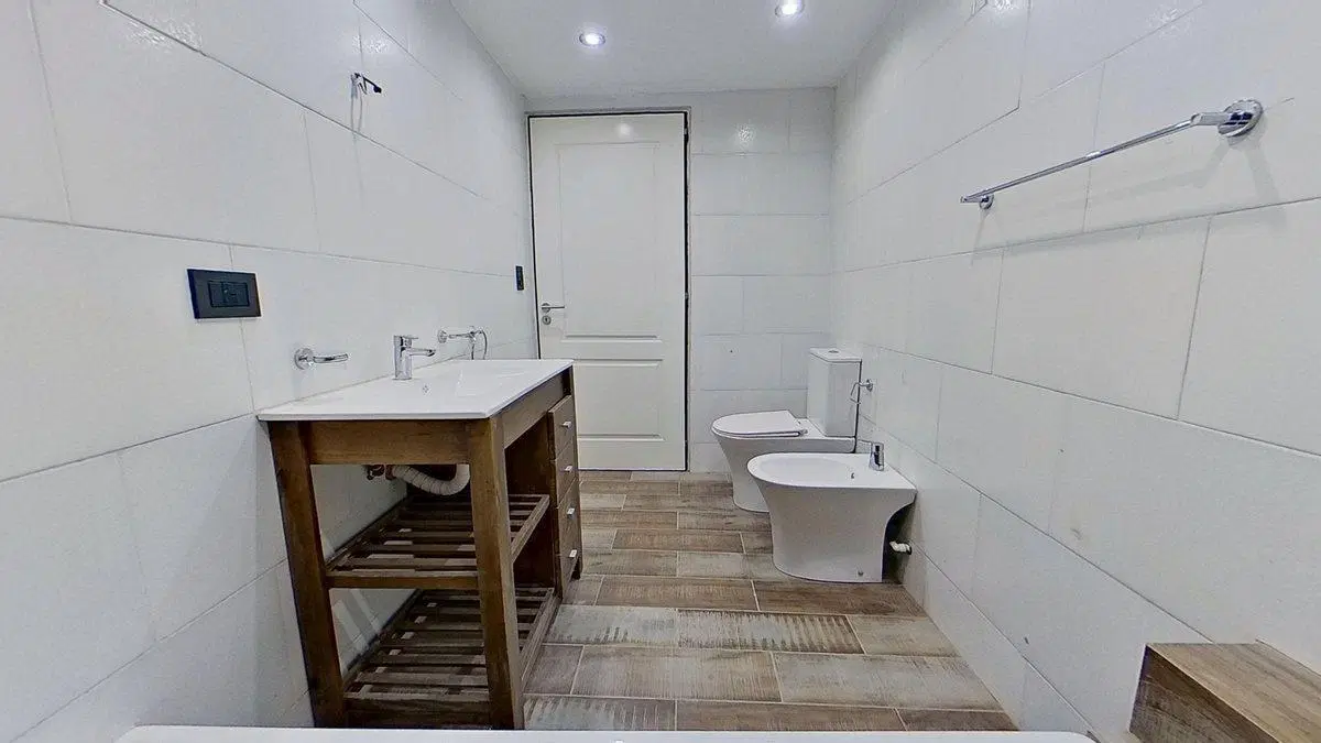 Triplex 3 ambientes con Jardín Parrilla y Cochera 5