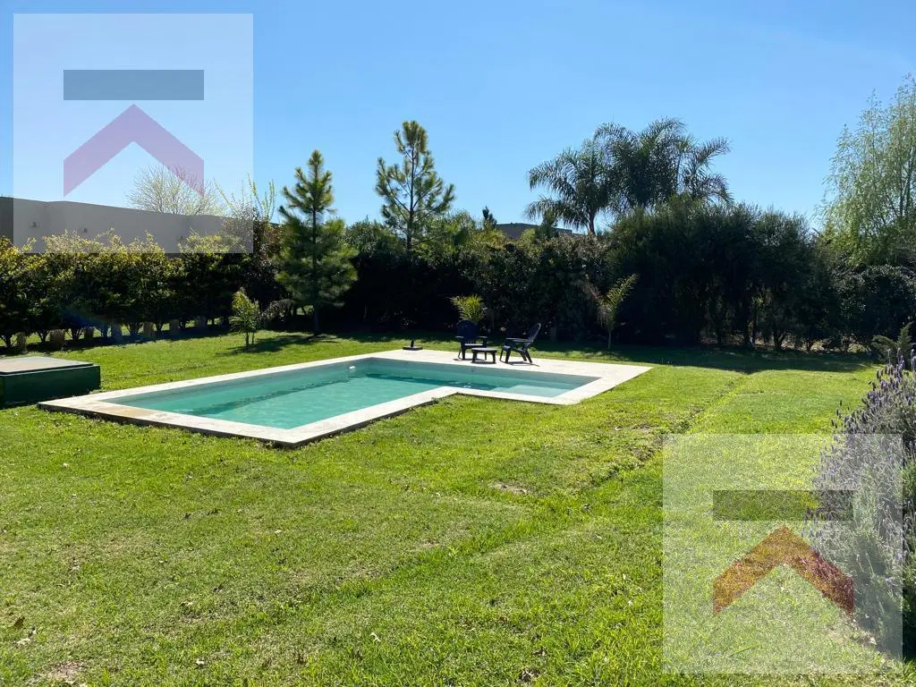 Casa en una planta 4 dorm gran parque con piscina Chacras de La Reserva Cardales 5