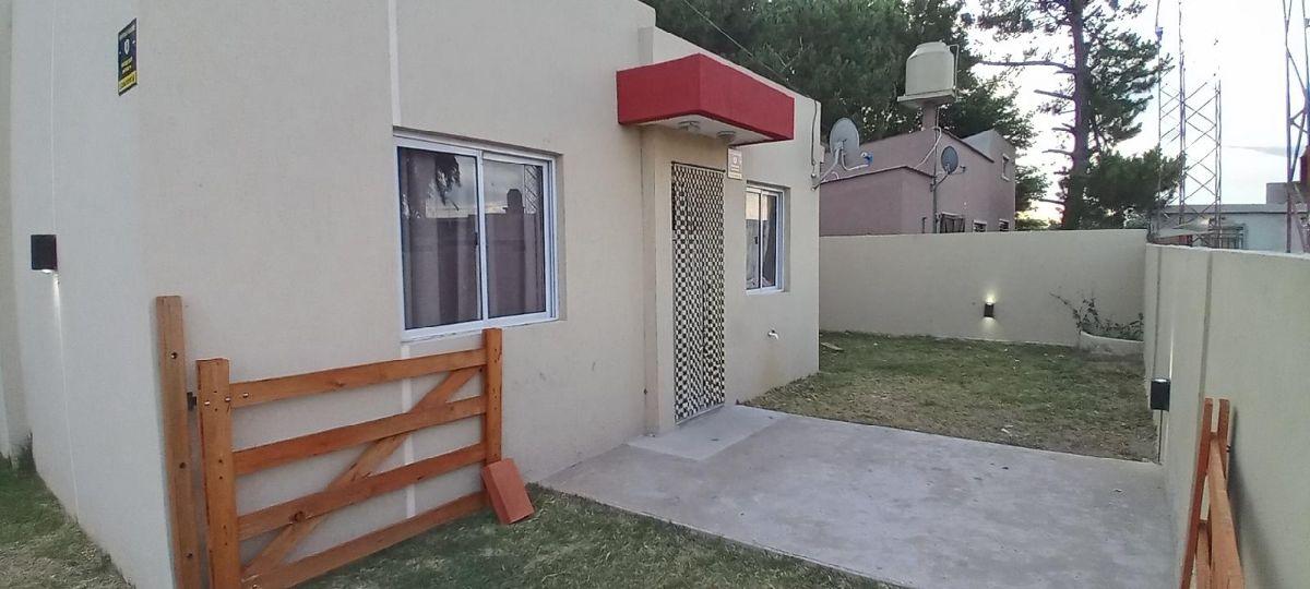 TIPO CASA CON COCHERA