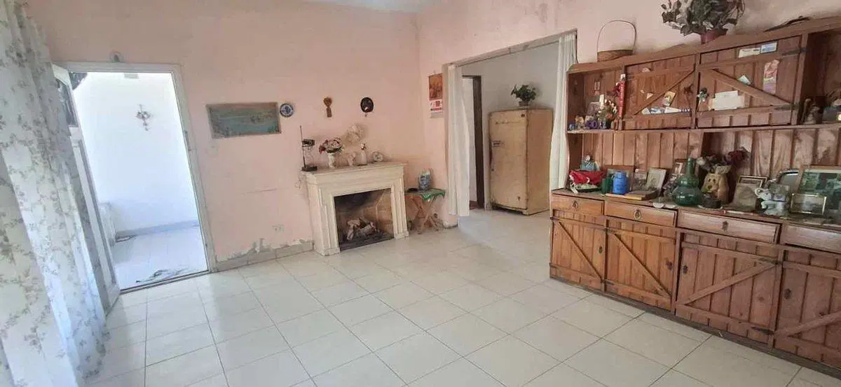 VENTA CASA DOS AMBIENTES EN MERLO CON PATIO Y COCH 8
