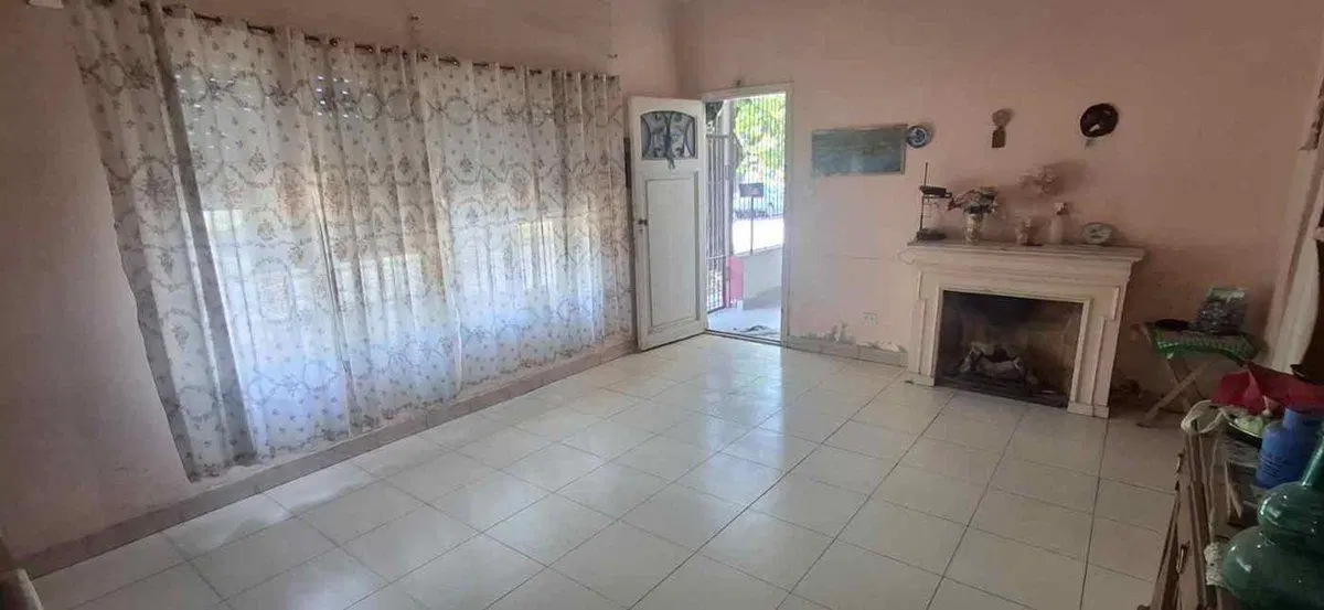 VENTA CASA DOS AMBIENTES EN MERLO CON PATIO Y COCH 1