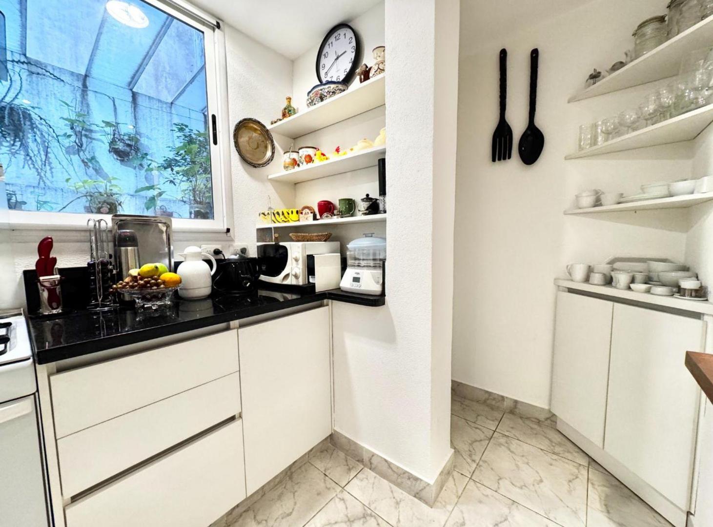 Foto de Venta Elegante PH RECICLADO con patios, imagen 5