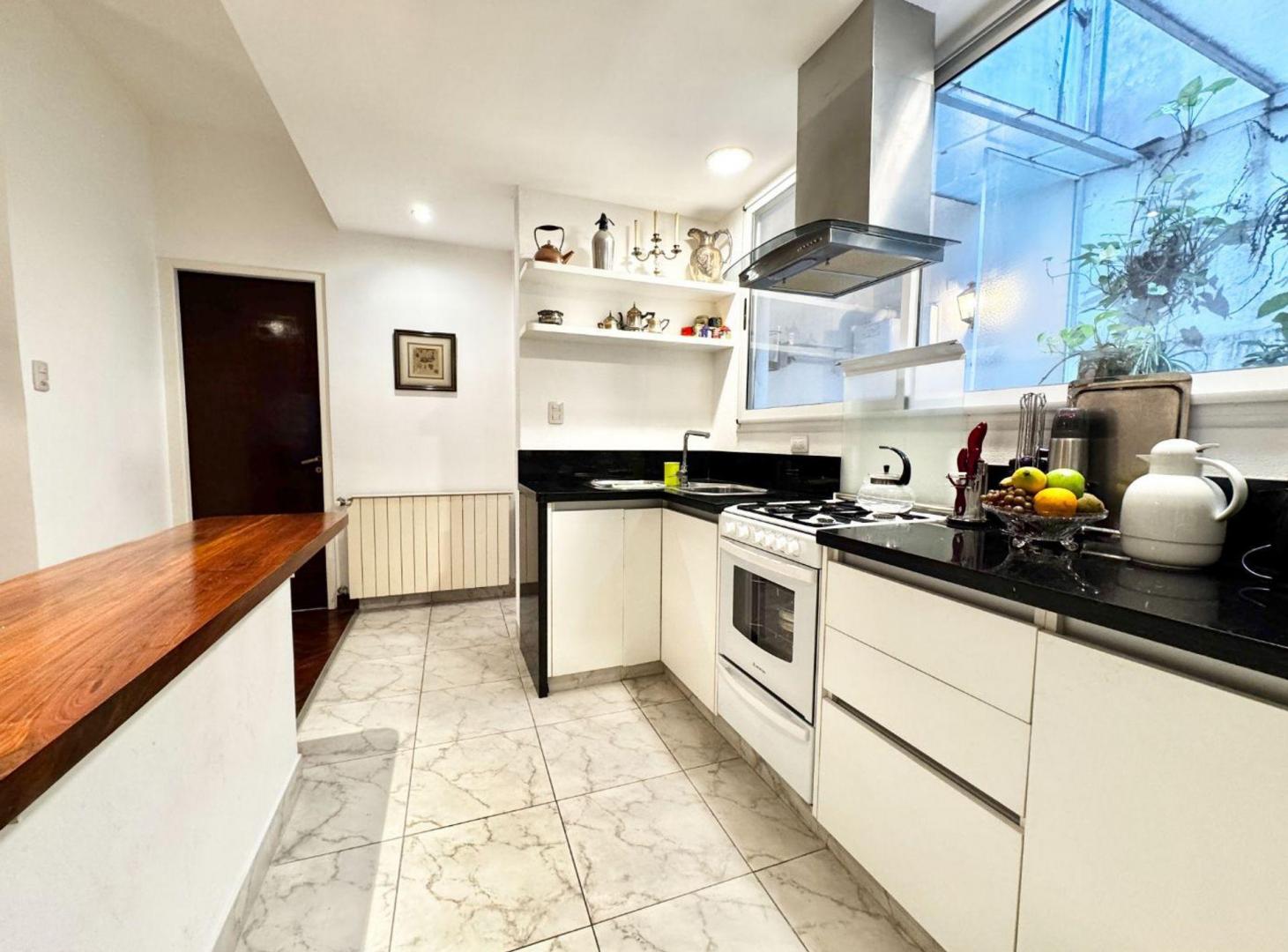 Foto de Venta Elegante PH RECICLADO con patios, imagen 4