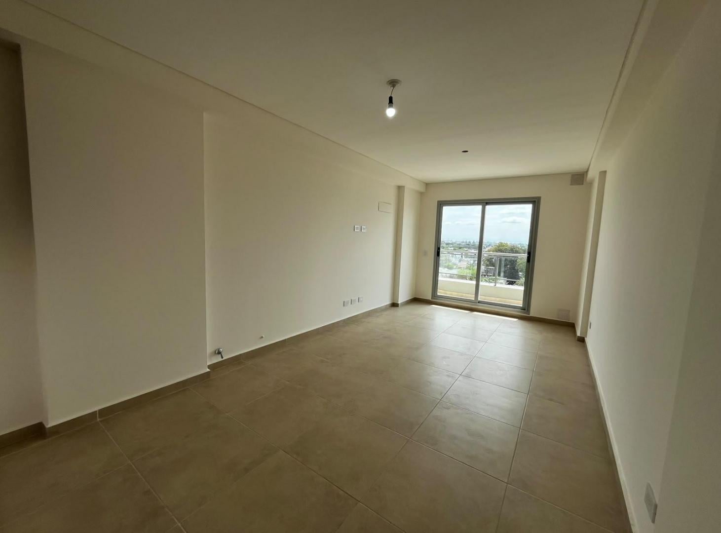 Foto de Alquiler Departamento en Bv. Pellegrini 3100, imagen 1