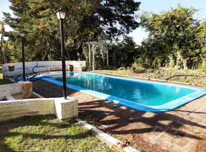 Alquiler Casa Familiar con Pileta y Parque en Golf Chascomús Country Club 1