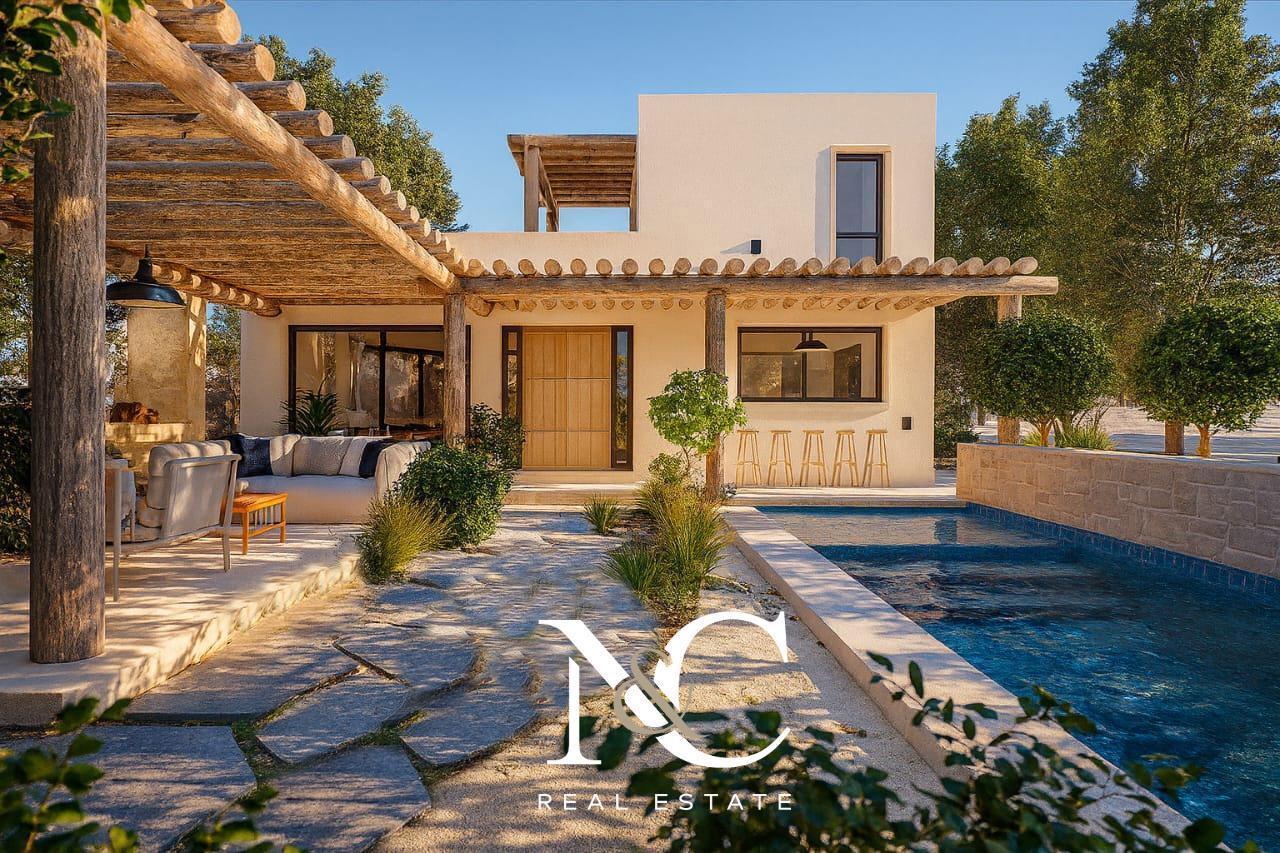 Casa en venta en Costa Esmeralda fondo con pinos