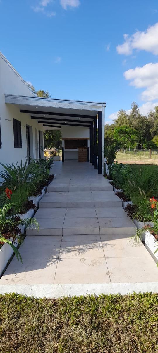 Casa en Barrio Privado Quiloaza de 3 Dorm, 2baños, Living Comedor, Jardin. 5
