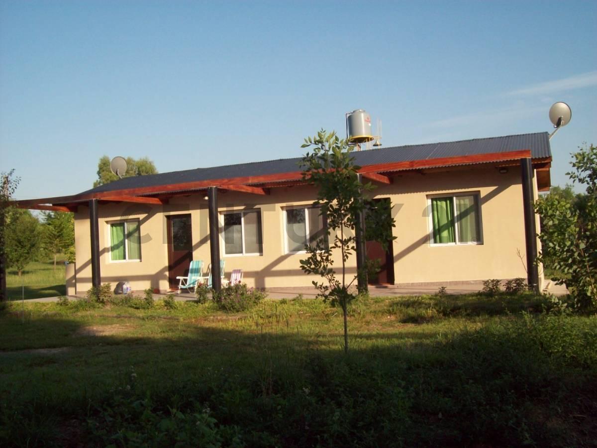 Foto de VENTA AMPLIO TERRENO CON DOS CABAÑAS - ZONA NORTE CONCEPCION DEL URUGUY, imagen 1