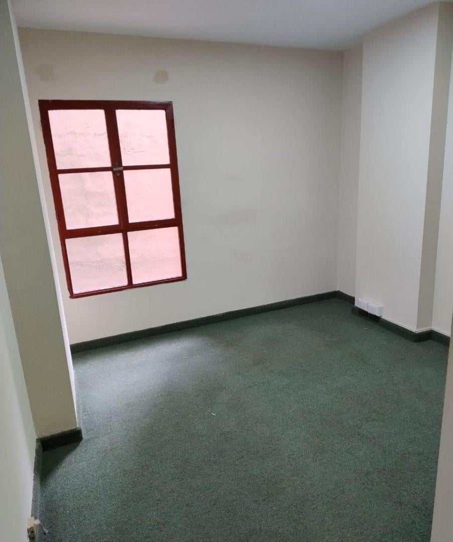 Bº Centro. AQUILO depto de 2 dormit + escritorio, con cocina separada.
