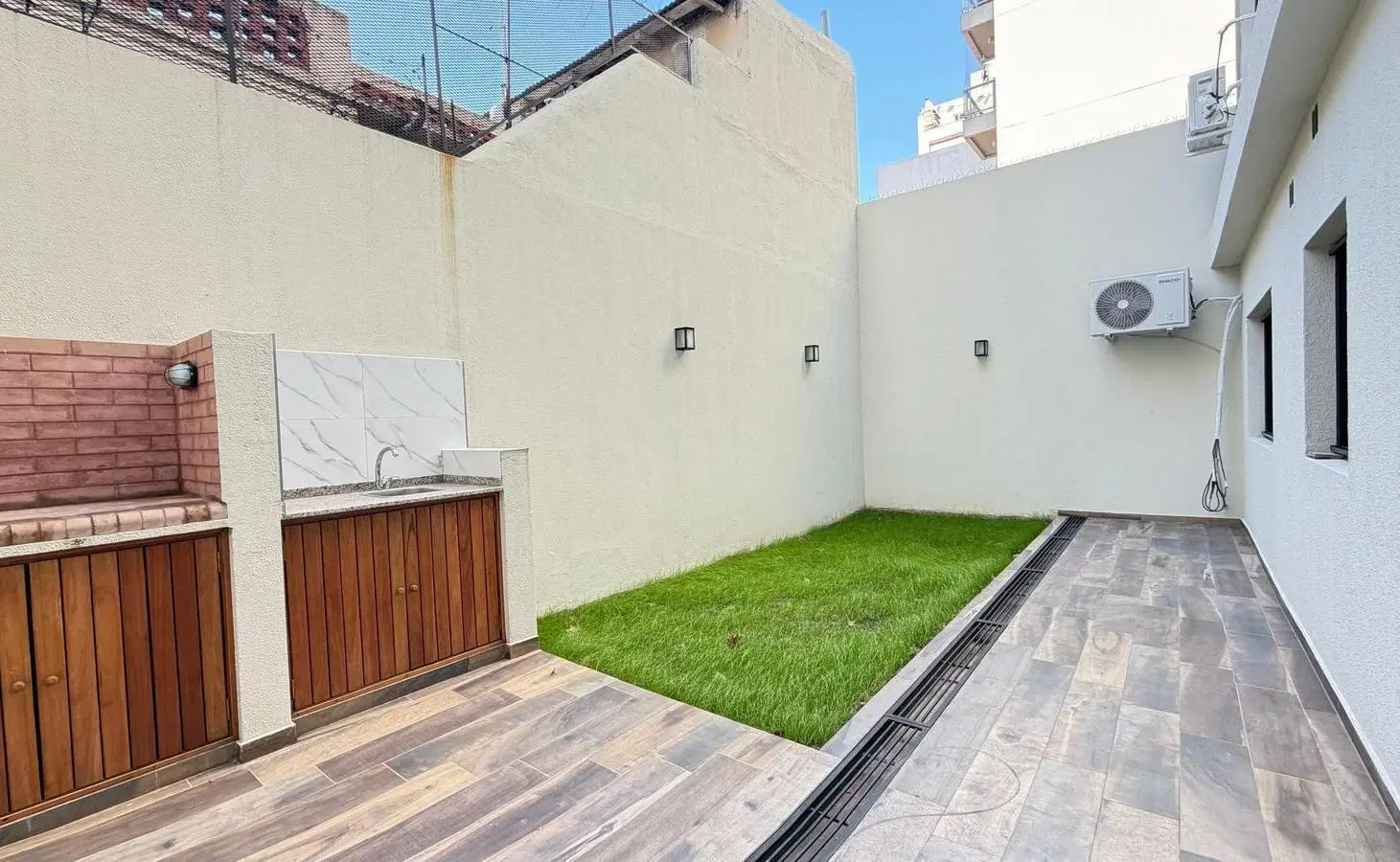 Departamento 3 ambientes en con jardín 1