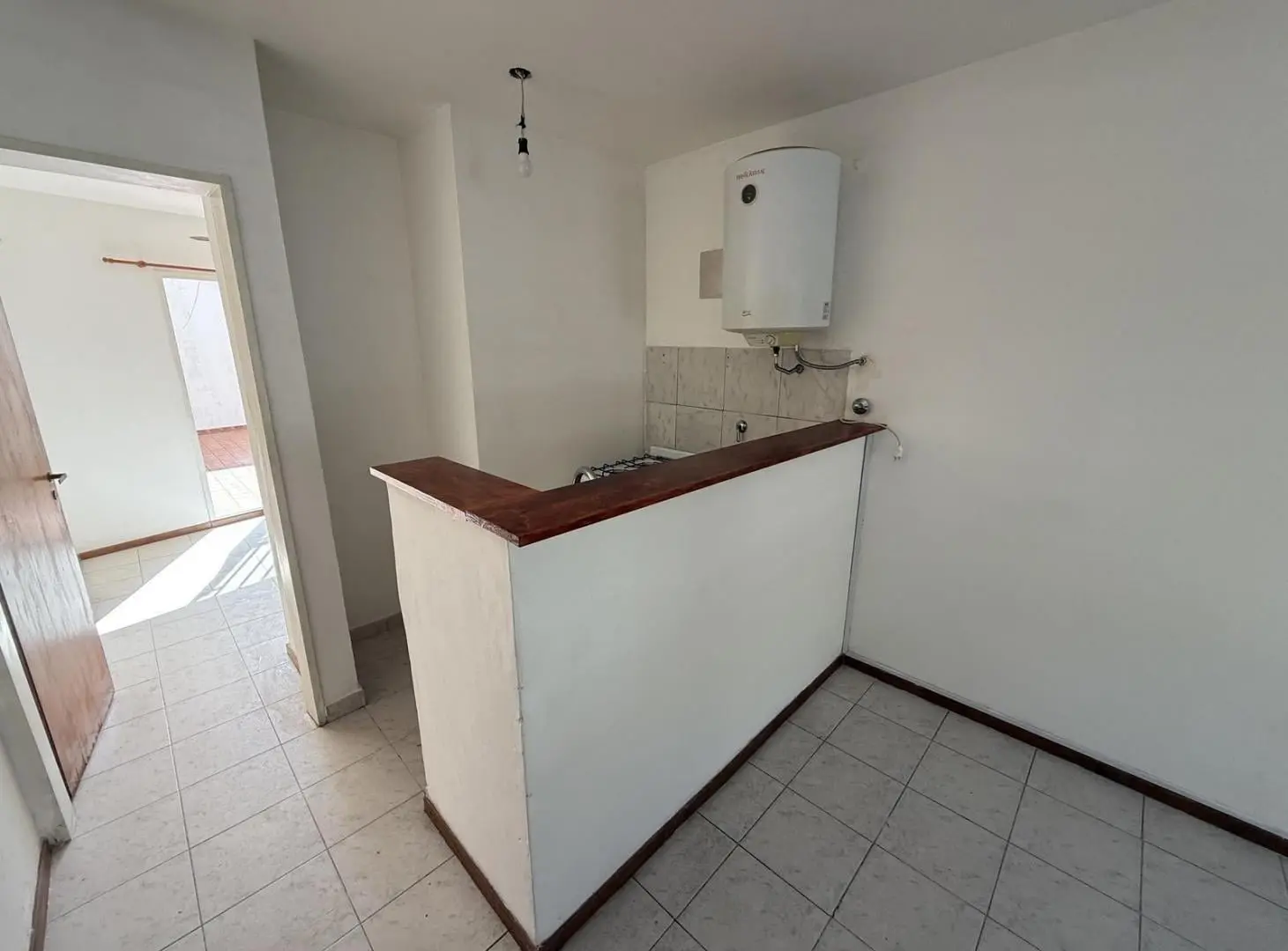 Departamento 1 dormitorio con patio - Luis Agote 3