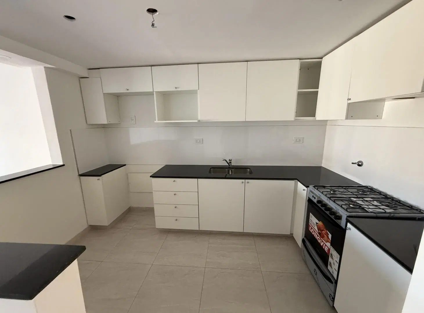 Venta depto 2 dormitorios con cochera - Barrio Martin 2