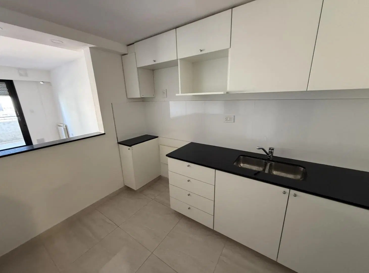 Venta depto 2 dormitorios con cochera - Barrio Martin 5