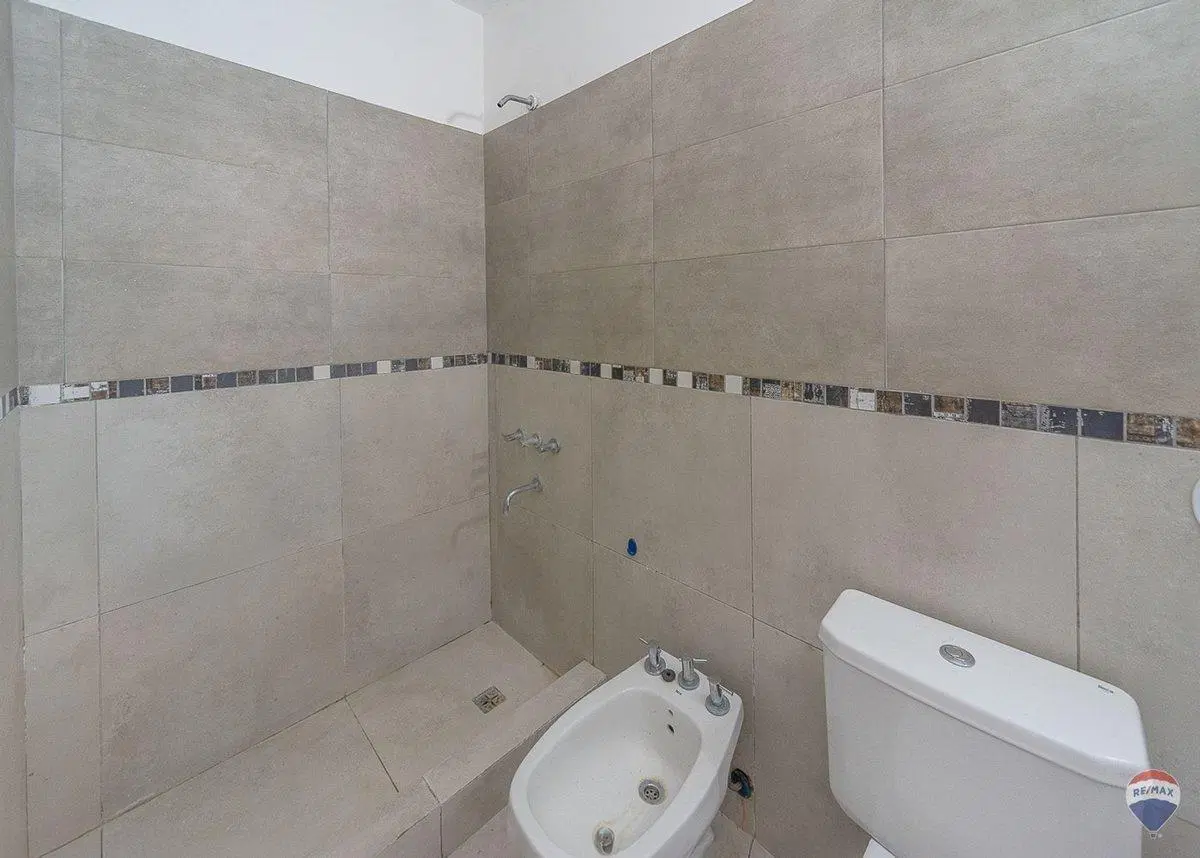 Venta Dpto Loft 2 amb con cochera Condominio Pilar 4