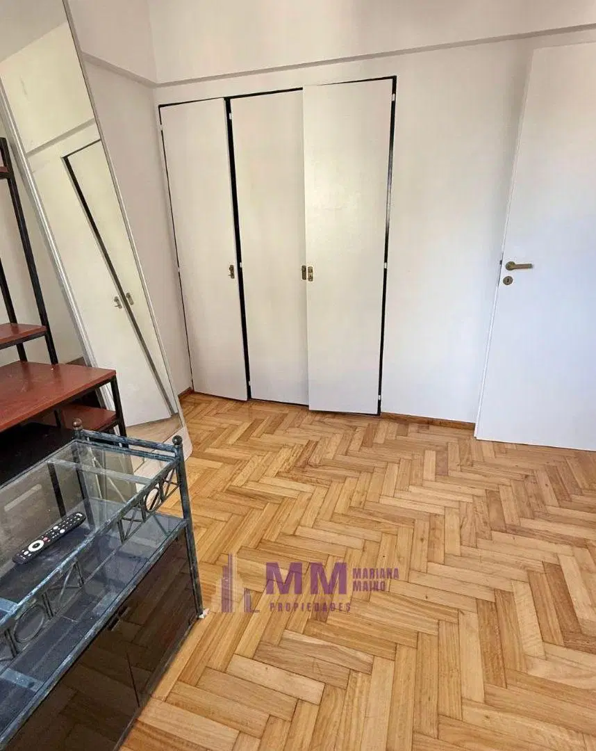 Departamento con 2 dormitorios balcón y cochera en alquiler en Martínez 3