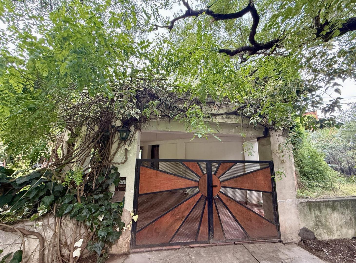 Foto de Casa de 4 habitaciones, cochera y jardín en Funes, imagen 3