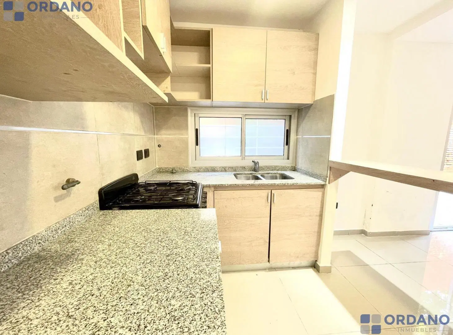 Departamento 2 dormitorios con patio Planta Baja B° Pueyrredón 3