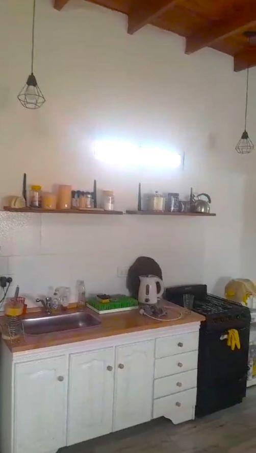 casa tipo loft sobre lote de 720 m2, pileta y quincho.