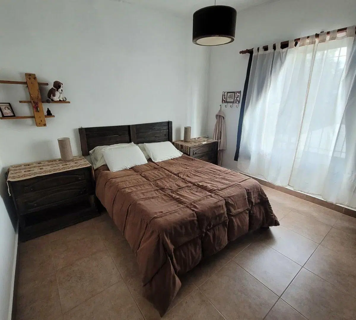 CASA EN LOTE PROPIO CON PARQUE Y PARRILLA 5