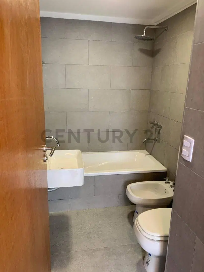 Departamento tipo Loft con Balcon aterrazado con Parrilla 4
