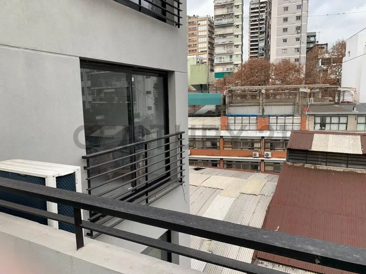 Departamento tipo Loft con Balcon aterrazado con Parrilla 5