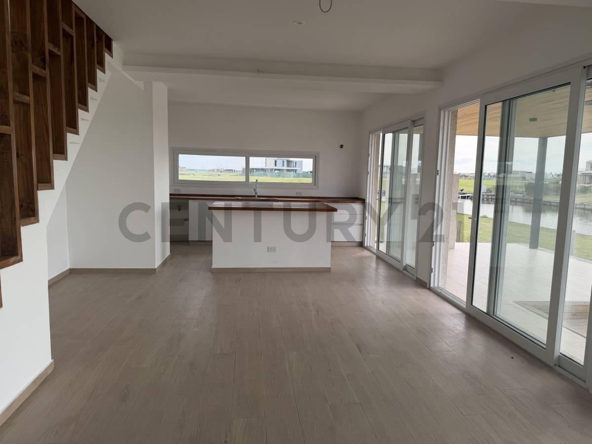 Foto de VENTA CASA 5 AMBIENTESEN EL NAUDIR LOTE CON SALIDA AL RIO A ESTRENAR, imagen 1